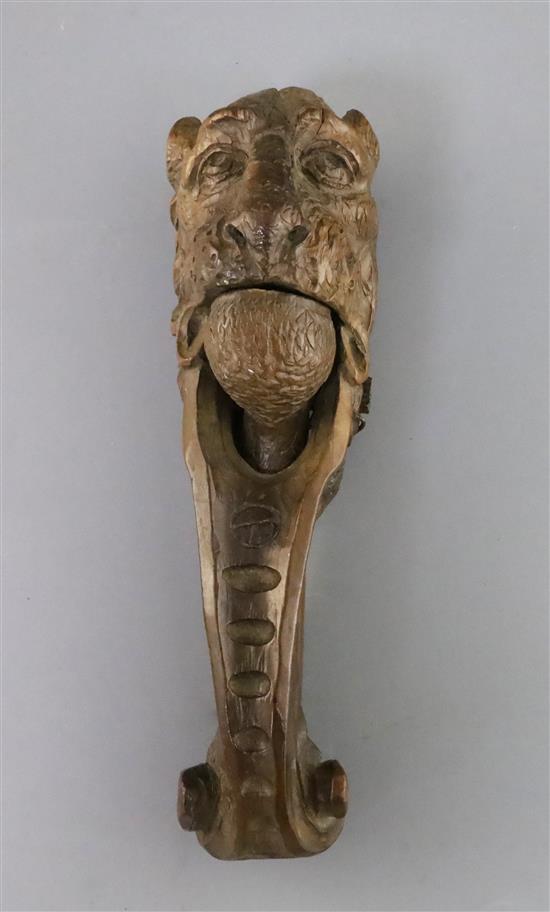 An early 19th century treen nutcracker, 10in.